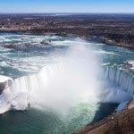 Niagara Falls is a group of three waterfalls along the border between the United States and Canada in New York and Ontario.