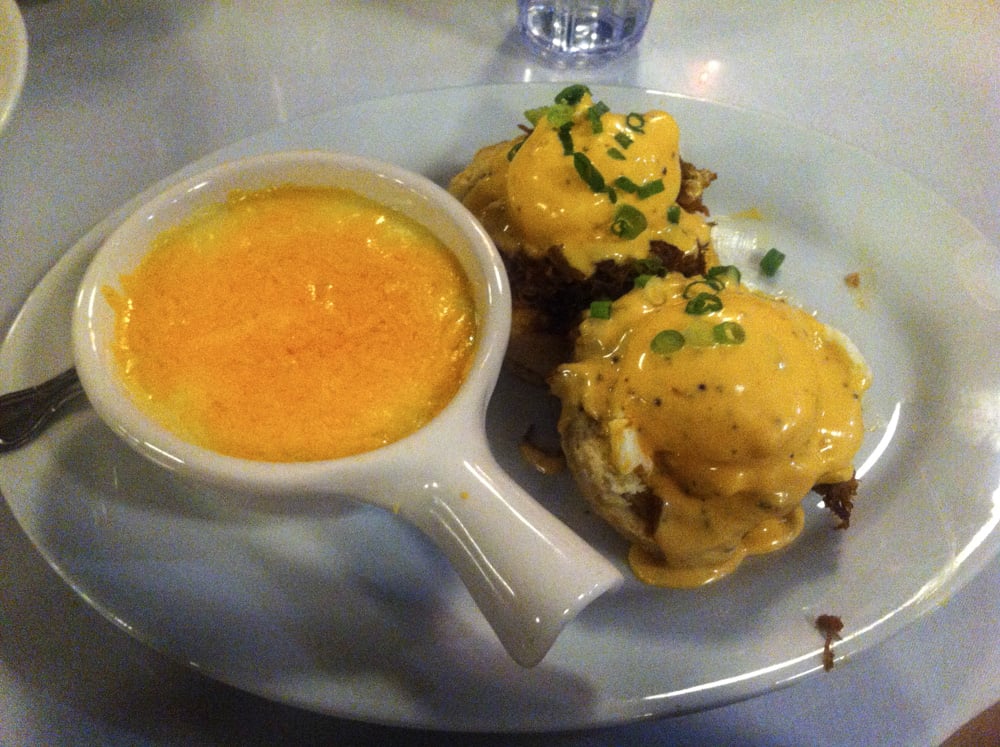 Eggs Benedict with a side of cheese grits