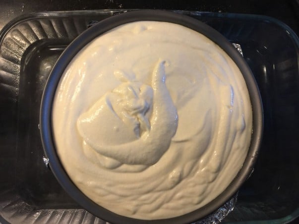 Cheese Cake in Spring Form Pan inside a Baking Tray