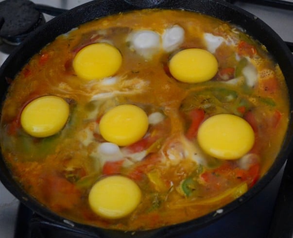 Moroccan Shakshouka - Breaking Eggs Over The Sauce